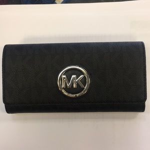 Black Michael Coors clutch new without tags